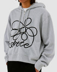 Sweat à capuche zippé avec logo fleuri
