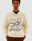 Pull en maille avec logo en fleuri