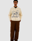 Pull en maille avec logo en fleuri