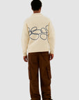 Pull en maille avec logo en fleuri