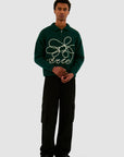 Pull en maille avec logo fleuri